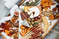 An inviting charcuterie board featuring assorted cheeses, fruits, nuts, and cured meats, perfect for gourmet gatherings.