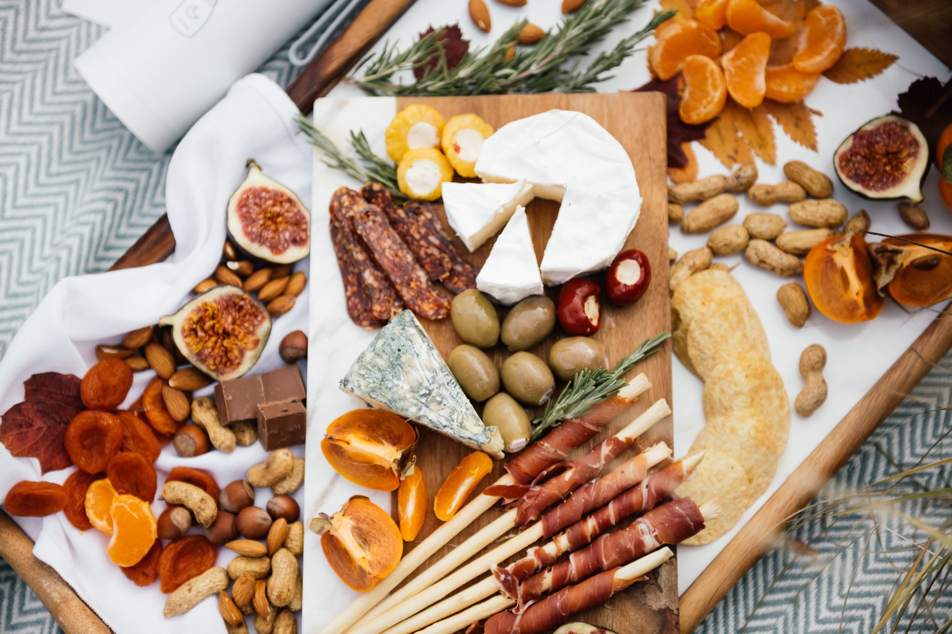 An inviting charcuterie board featuring assorted cheeses, fruits, nuts, and cured meats, perfect for gourmet gatherings.